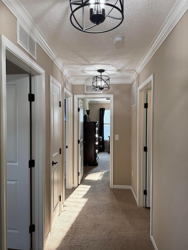 150 Shawnee Dr, Pickerington, OH 43147 - corridor with light carpet, a textured ceiling, ornamental molding, and baseboards