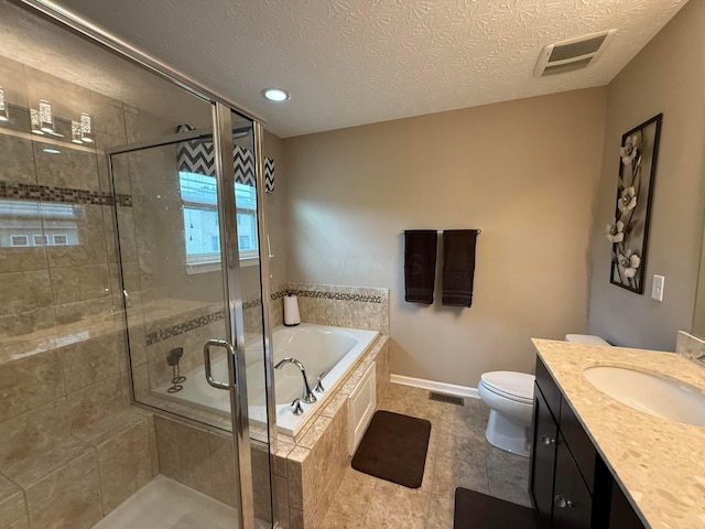 150 Shawnee Dr, Pickerington, OH 43147 - bathroom featuring a garden tub, vanity, a shower stall, tile patterned flooring, and toilet