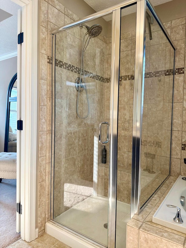 150 Shawnee Dr, Pickerington, OH 43147 - bathroom featuring connected bathroom, crown molding, a shower stall, and a bath