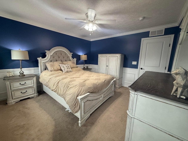 150 Shawnee Dr, Pickerington, OH 43147 - bedroom with wainscoting, a textured ceiling, carpet flooring, a ceiling fan, and ornamental molding