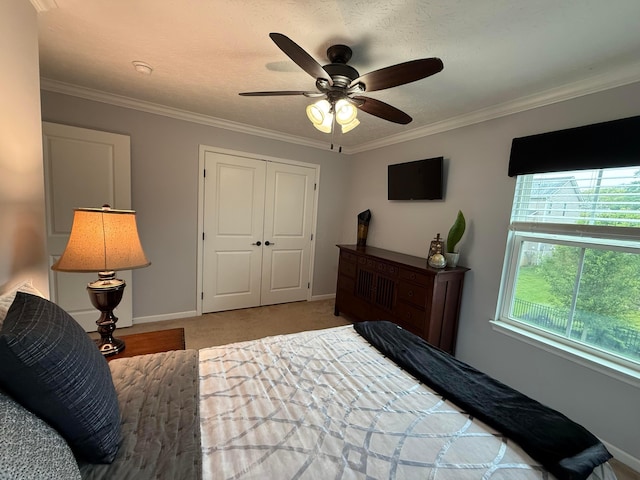 150 Shawnee Dr, Pickerington, OH 43147 - carpeted bedroom with ornamental molding, baseboards, a ceiling fan, and a closet