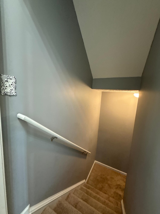 150 Shawnee Dr, Pickerington, OH 43147 - staircase with baseboards, carpet floors, and vaulted ceiling