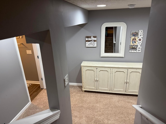 150 Shawnee Dr, Pickerington, OH 43147 - hallway with light colored carpet and baseboards