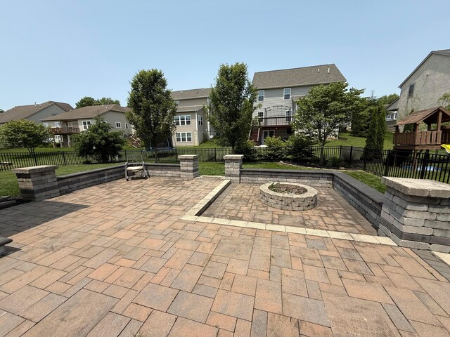 150 Shawnee Dr, Pickerington, OH 43147 - view of patio with a fire pit and a residential view