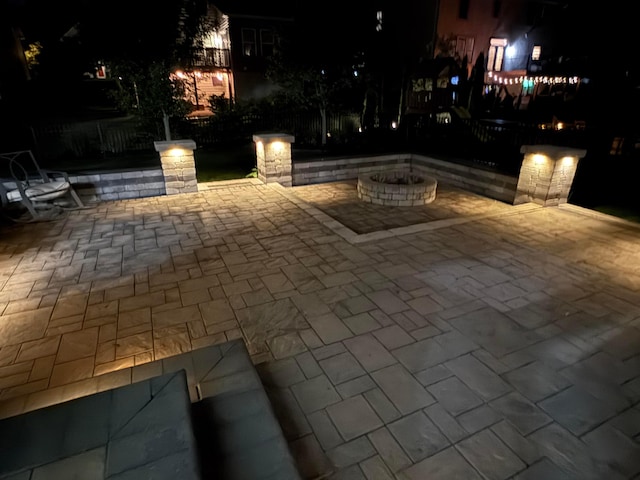 150 Shawnee Dr, Pickerington, OH 43147 - patio at night with an outdoor fire pit and a patio