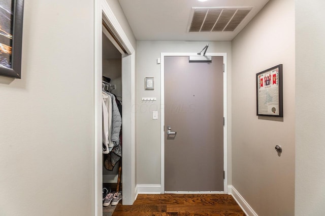 10 E Weber Rd Unit 205, Columbus, OH 43202 - corridor featuring dark wood-style floors and baseboards