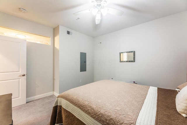 10 E Weber Rd Unit 205, Columbus, OH 43202 - bedroom featuring electric panel, light carpet, baseboards, and a ceiling fan
