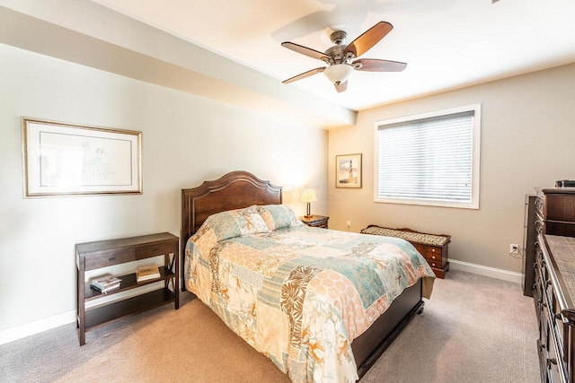 10 E Weber Rd Unit 205, Columbus, OH 43202 - bedroom with light carpet, baseboards, and a ceiling fan