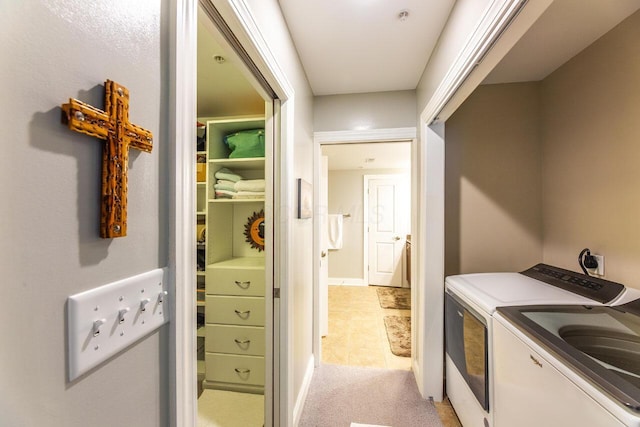 10 E Weber Rd Unit 205, Columbus, OH 43202 - laundry area featuring separate washer and dryer, light colored carpet, and baseboards