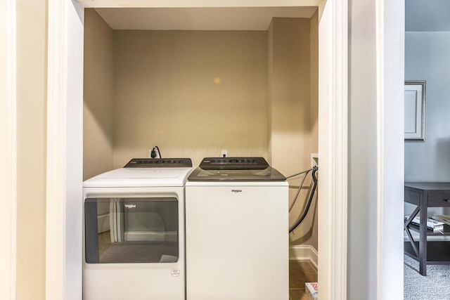 10 E Weber Rd Unit 205, Columbus, OH 43202 - washroom featuring washer and dryer and baseboards