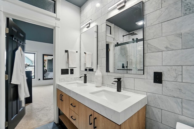 158 Punta Aly, Columbus, OH 43201 - full bath featuring double vanity, a tile shower, and tile walls