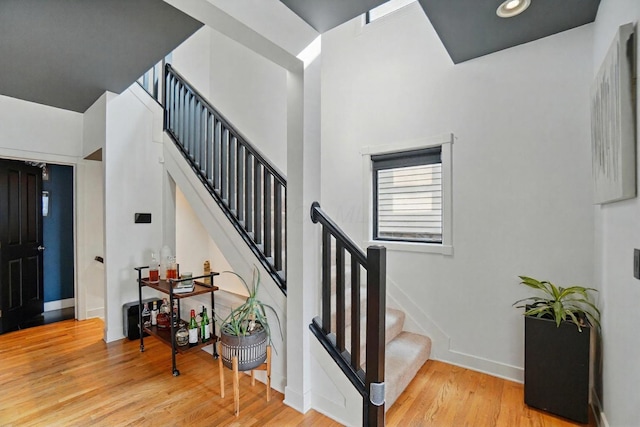 158 Punta Aly, Columbus, OH 43201 - stairway with wood finished floors, baseboards, and recessed lighting