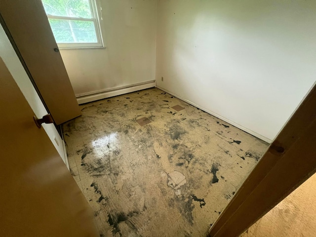 5340 Edgeview Rd, Columbus, OH 43207 - spare room featuring a baseboard heating unit and baseboards