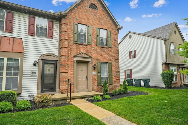 5905 Shadow Lake Cir, Columbus, OH 43235 - multi unit property featuring a front lawn and brick siding
