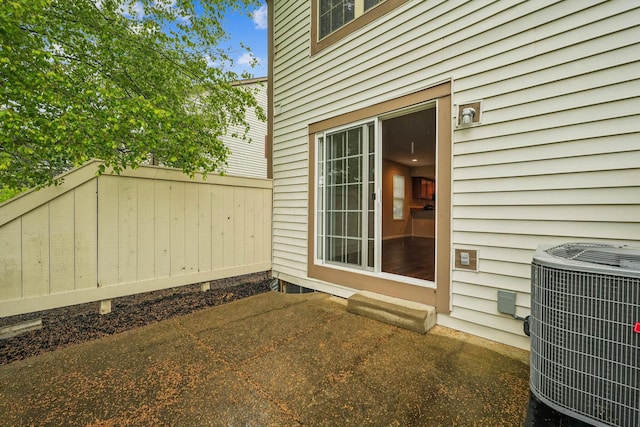 5905 Shadow Lake Cir, Columbus, OH 43235 - view of exterior entry with cooling unit and a patio area