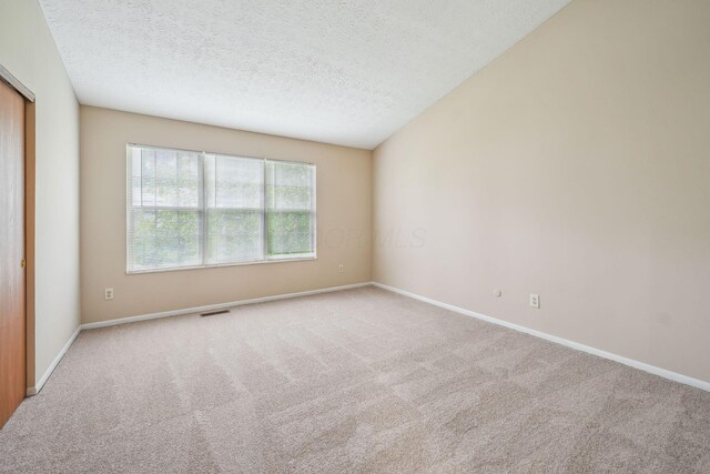 5905 Shadow Lake Cir, Columbus, OH 43235 - unfurnished room with carpet flooring, a textured ceiling, and baseboards