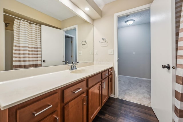 5905 Shadow Lake Cir, Columbus, OH 43235 - bathroom featuring vanity, wood finished floors, and baseboards