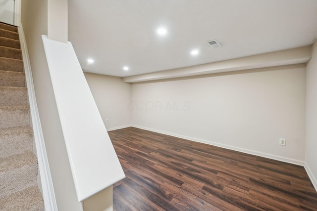5905 Shadow Lake Cir, Columbus, OH 43235 - finished below grade area featuring dark wood finished floors, baseboards, stairway, and recessed lighting