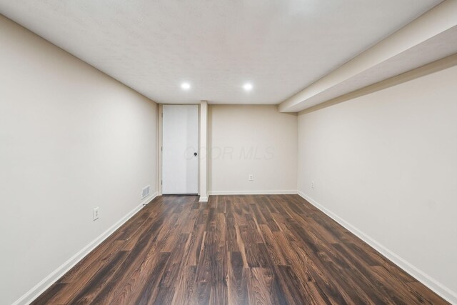 5905 Shadow Lake Cir, Columbus, OH 43235 - finished below grade area with dark wood-style flooring, recessed lighting, and baseboards