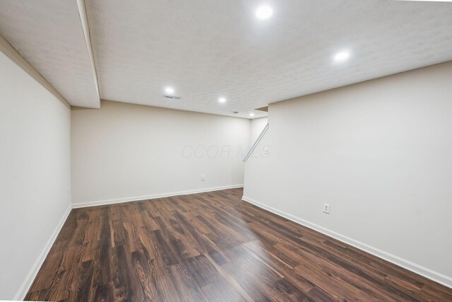 5905 Shadow Lake Cir, Columbus, OH 43235 - finished below grade area with baseboards, recessed lighting, and dark wood finished floors