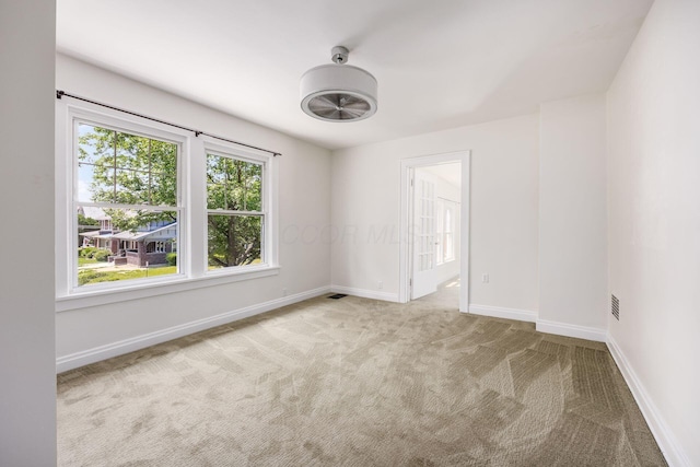 320 Rhoads Ave, Columbus, OH 43205 - spare room with carpet floors and baseboards