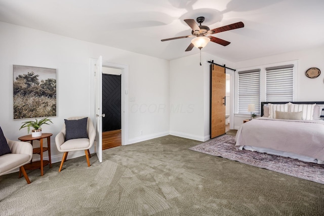 320 Rhoads Ave, Columbus, OH 43205 - bedroom with carpet flooring, a barn door, baseboards, and a ceiling fan