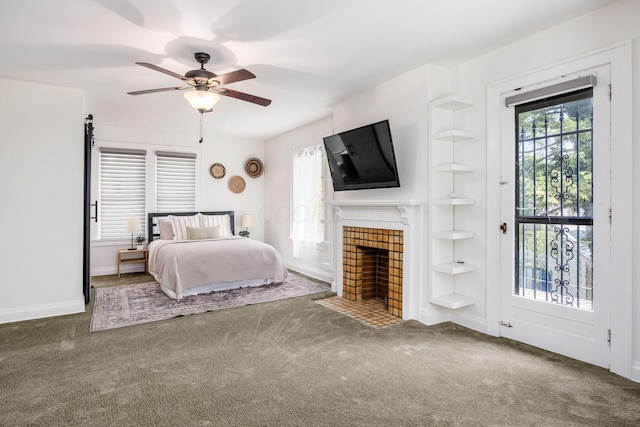 320 Rhoads Ave, Columbus, OH 43205 - bedroom featuring carpet, a fireplace, baseboards, and ceiling fan