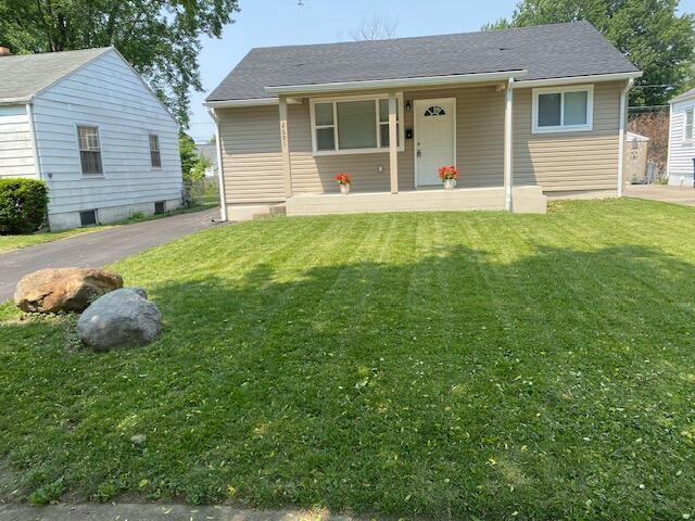2691 Howey Rd, Columbus, OH 43211 - view of front of home featuring a porch and a front yard