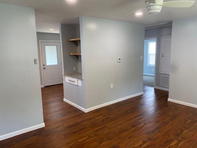 2691 Howey Rd, Columbus, OH 43211 - unfurnished room featuring ceiling fan, baseboards, dark wood-type flooring, and recessed lighting