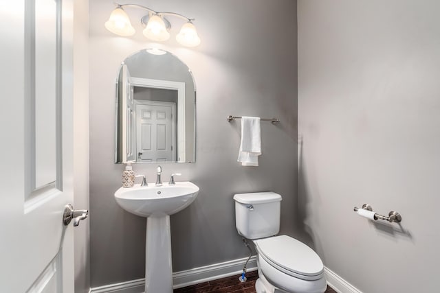 7685 Skarlocken Grn, New Albany, OH 43054 - bathroom featuring toilet and wood finished floors