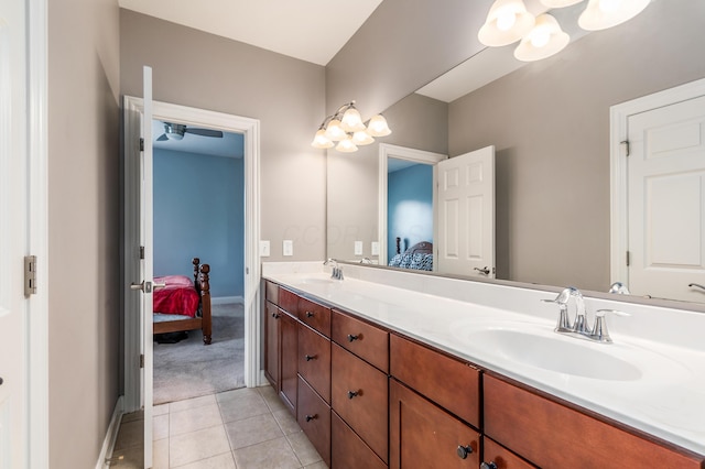 7685 Skarlocken Grn, New Albany, OH 43054 - full bathroom featuring ensuite bath, double vanity, tile patterned floors, and a chandelier