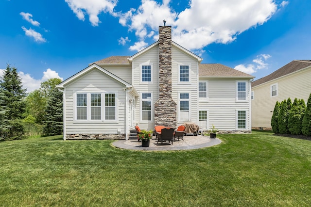 7685 Skarlocken Grn, New Albany, OH 43054 - rear view of property with a patio, a chimney, a yard, and a shingled roof