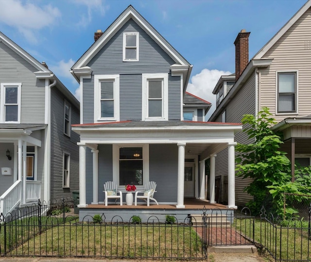 1140 Summit St, Columbus, OH 43201 - view of front of property featuring a porch