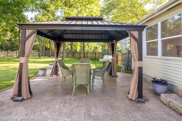 3476 Bayspirit Ct, Reynoldsburg, OH 43068 - fenced backyard with a gazebo, outdoor dining area, and a patio