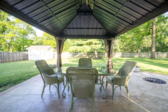 3476 Bayspirit Ct, Reynoldsburg, OH 43068 - fenced backyard featuring a patio area, a gazebo, outdoor dining space, and a storage shed