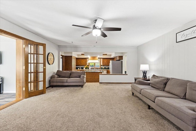 685 Hawthorne Dr, Circleville, OH 43113 - living room featuring a ceiling fan and light carpet