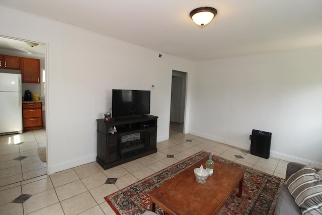 3136 E 12th Ave, Columbus, OH 43219 - living room with light tile patterned flooring and baseboards