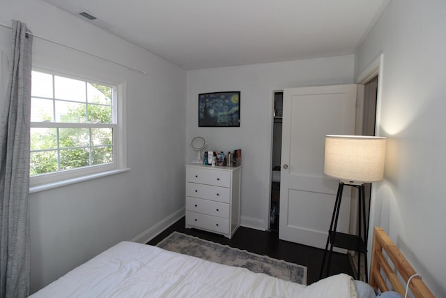 3136 E 12th Ave, Columbus, OH 43219 - bedroom with dark wood-style floors and baseboards
