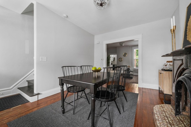 994 Delaware Ave, Columbus, OH 43201 - dining space featuring hardwood / wood-style floors, baseboards, and stairs