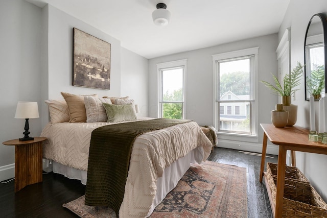 994 Delaware Ave, Columbus, OH 43201 - bedroom featuring dark wood finished floors and baseboards