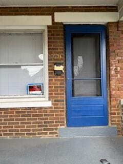 863 E Whittier St, Columbus, OH 43206 - view of exterior entry with brick siding