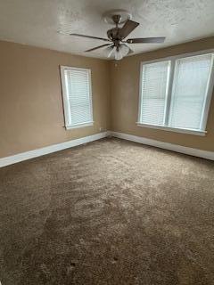 863 E Whittier St, Columbus, OH 43206 - carpeted empty room with baseboards and ceiling fan
