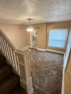 863 E Whittier St, Columbus, OH 43206 - stairs with carpet floors, ceiling fan, a textured ceiling, and baseboards
