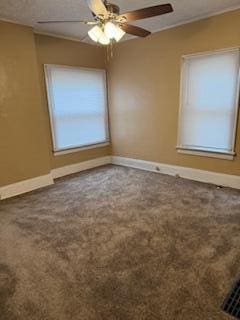 863 E Whittier St, Columbus, OH 43206 - empty room with baseboards, carpet floors, and ceiling fan