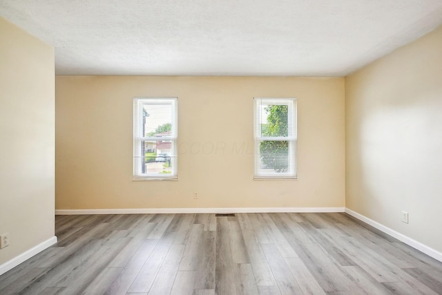 2117 Kilbourne Ave, Columbus, OH 43229 - unfurnished room featuring wood finished floors and baseboards