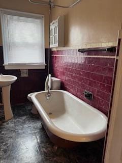 865 E Whittier St, Columbus, OH 43206 - full bathroom featuring a freestanding tub and wainscoting
