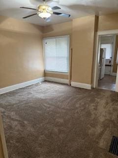 865 E Whittier St, Columbus, OH 43206 - empty room with carpet, baseboards, and ceiling fan