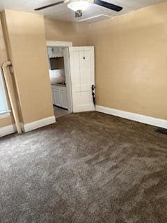 865 E Whittier St, Columbus, OH 43206 - empty room with baseboards, a ceiling fan, and carpet floors