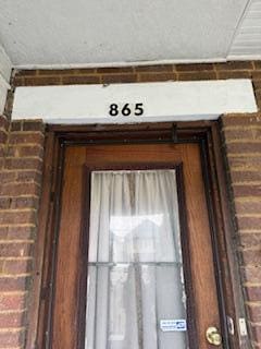 865 E Whittier St, Columbus, OH 43206 - entrance to property featuring brick siding