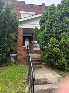 865 E Whittier St, Columbus, OH 43206 - view of exterior entry with brick siding